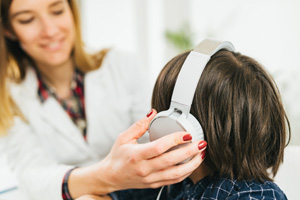 woman giving hearing test